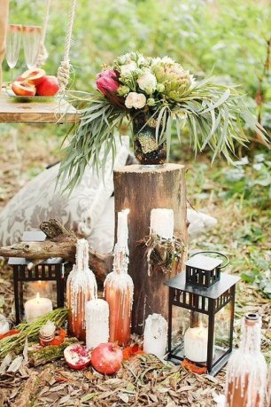 Бутылки в декоре свадебной фотозоны
